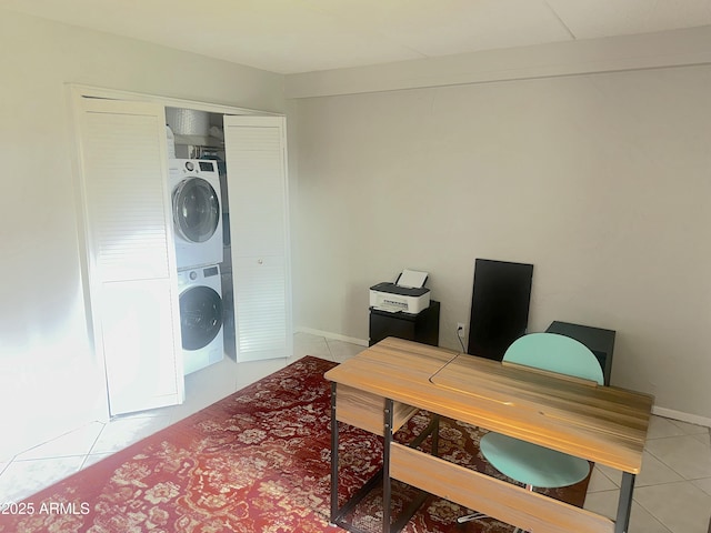 4201 E Camelback Rd Unit 51, Phoenix, AZ 85018 - office with estacked washer and dryer, light tile patterned floors, and baseboards