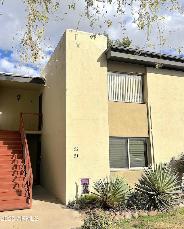 4201 E Camelback Rd Unit 51, Phoenix, AZ 85018 - view of side of home with stairway