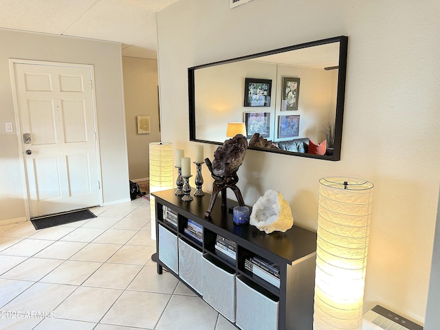 4201 E Camelback Rd Unit 51, Phoenix, AZ 85018 - foyer with light tile patterned floors