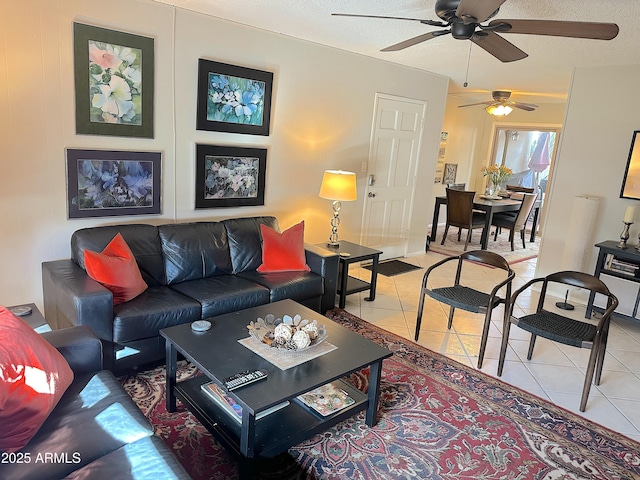 4201 E Camelback Rd Unit 51, Phoenix, AZ 85018 - living area featuring a ceiling fan and light tile patterned floors