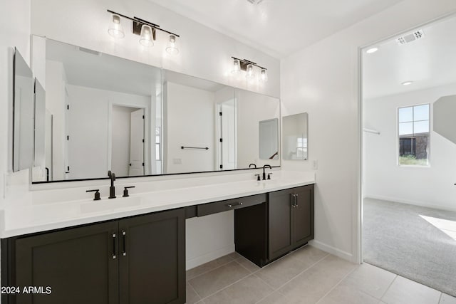 bathroom with vanity and tile patterned floors