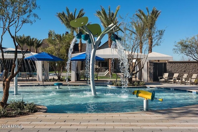 view of pool featuring pool water feature