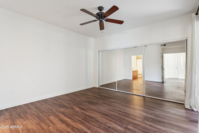 15252 N 100th St Unit 1147, Scottsdale, AZ 85260 - unfurnished bedroom with wood finished floors, a closet, and ceiling fan