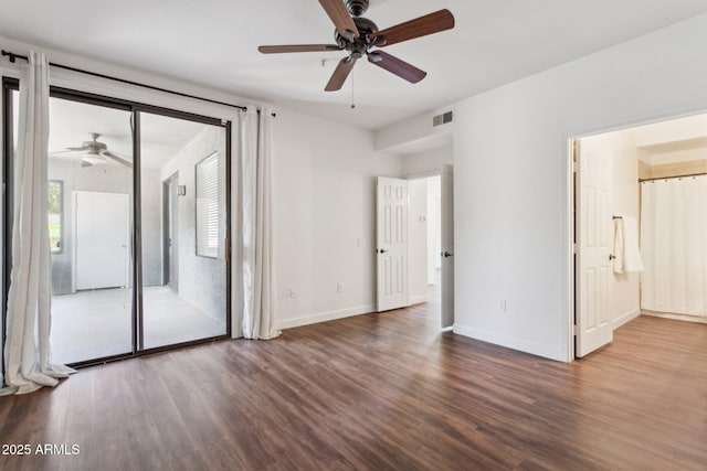 15252 N 100th St Unit 1147, Scottsdale, AZ 85260 - unfurnished bedroom featuring access to exterior, wood finished floors, ensuite bath, and ceiling fan