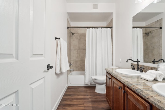 15252 N 100th St Unit 1147, Scottsdale, AZ 85260 - full bathroom featuring double vanity, shower / bath combination with curtain, and wood finished floors
