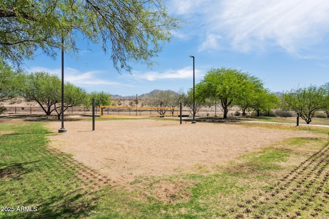 15252 N 100th St Unit 1147, Scottsdale, AZ 85260 - surrounding community with volleyball court and a mountain view