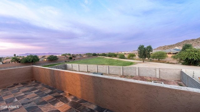 32211 N Lepa Dr, San Tan Valley, AZ 85144 - patio terrace at dusk featuring fence and a balcony