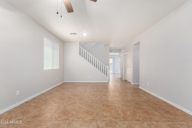 spare room featuring ceiling fan