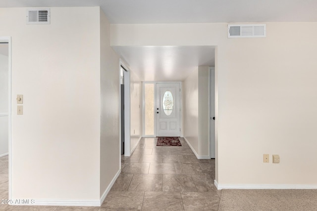 13842 N Tan Tara Dr, Sun City, AZ 85351 - foyer with baseboards and visible vents