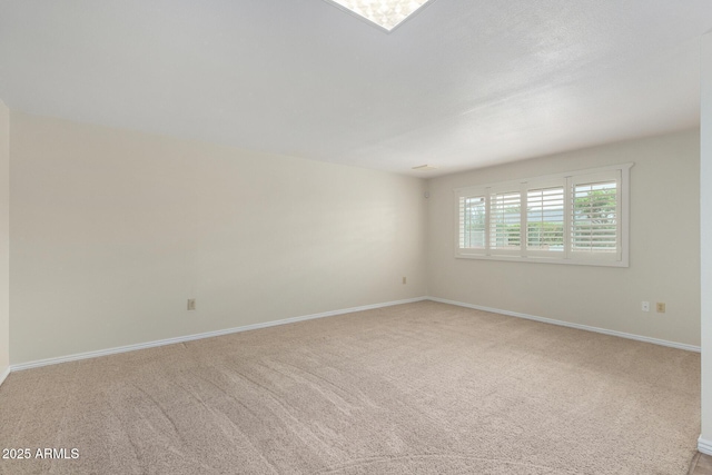 13842 N Tan Tara Dr, Sun City, AZ 85351 - carpeted empty room with baseboards