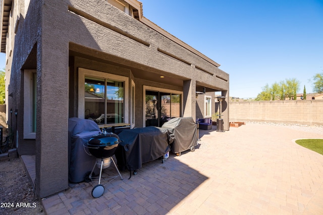 view of patio featuring a grill