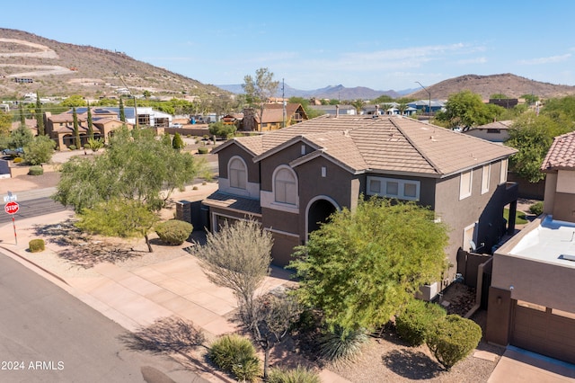 drone / aerial view featuring a mountain view