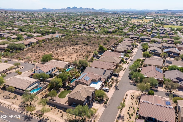 drone / aerial view featuring a mountain view