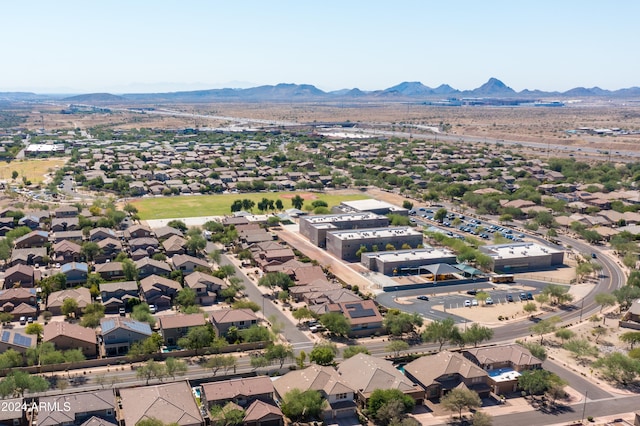 birds eye view of property featuring a mountain view