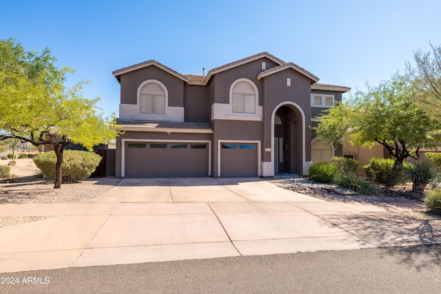 view of front of property featuring a garage