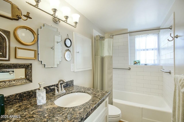 full bathroom featuring shower / tub combo, vanity, and toilet