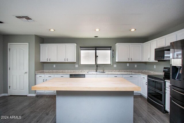 kitchen featuring white cabinets, sink, dark wood-type flooring, and wooden counters