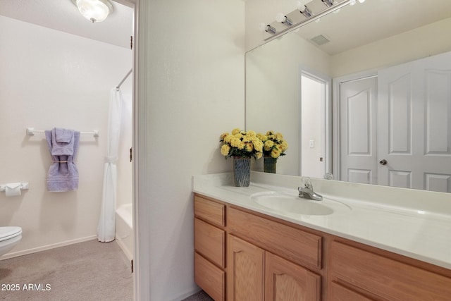 full bathroom with vanity, visible vents, baseboards, shower / tub combo, and toilet