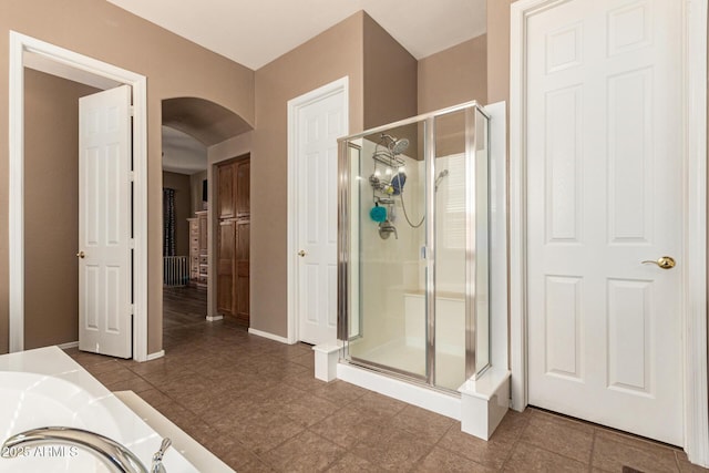 2945 E Clifton Ave, Gilbert, AZ 85295 - bathroom featuring a shower stall, tile patterned flooring, and baseboards