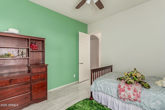 2945 E Clifton Ave, Gilbert, AZ 85295 - bedroom with light wood-type flooring, a ceiling fan, and baseboards