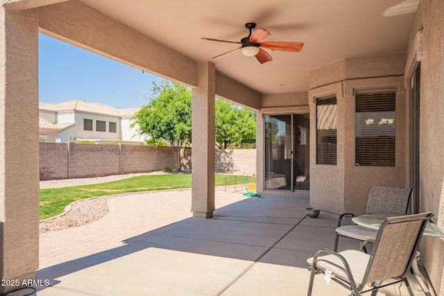 2945 E Clifton Ave, Gilbert, AZ 85295 - fenced backyard featuring a ceiling fan and a patio area