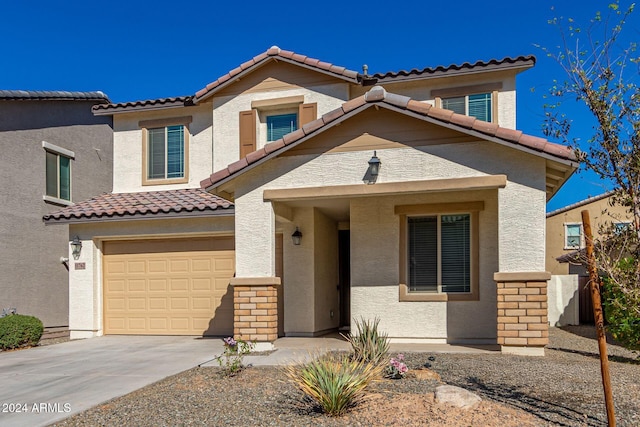 view of front of home with a garage