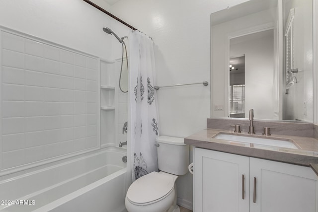 full bathroom featuring vanity, shower / bath combo, and toilet