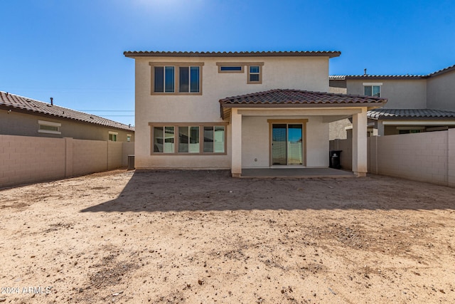 back of house featuring a patio