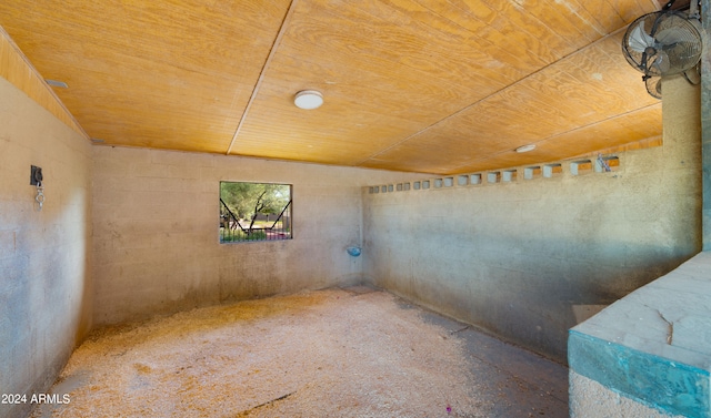 unfurnished room featuring lofted ceiling and wood ceiling