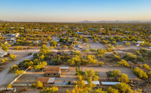 aerial view at dusk with a mountain view