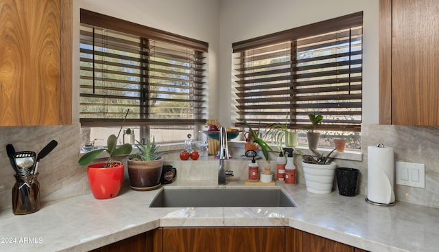 kitchen with sink and decorative backsplash