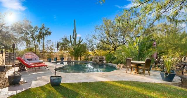 view of pool with a patio area