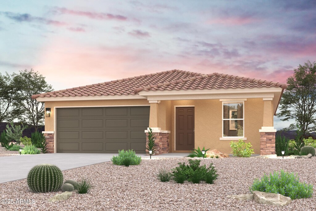3820 W Long Dr, Eloy, AZ 85131 - view of front of house featuring a tile roof, a garage, concrete driveway, stone siding, and stucco siding