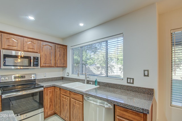 kitchen with stainless steel appliances and sink