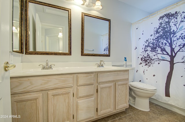 bathroom featuring toilet, vanity, tile patterned flooring, and walk in shower