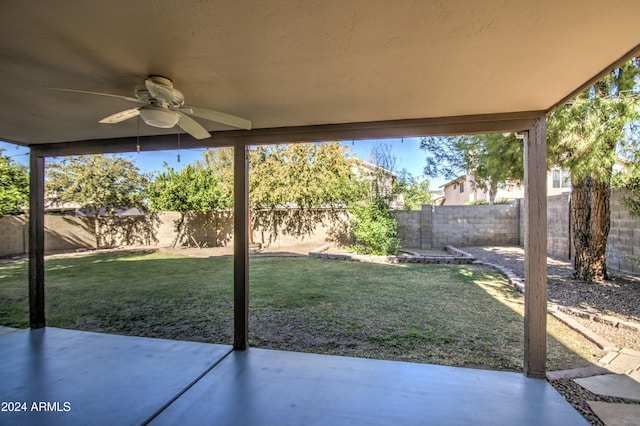 view of patio featuring ceiling fan