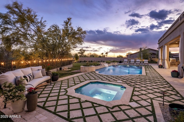view of pool featuring a fenced in pool, a fenced backyard, an in ground hot tub, an outdoor living space, and a patio area