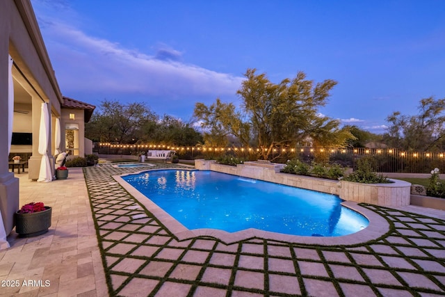 view of swimming pool with a patio, a fenced backyard, and a fenced in pool