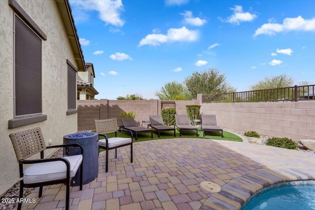 view of patio featuring a fenced backyard