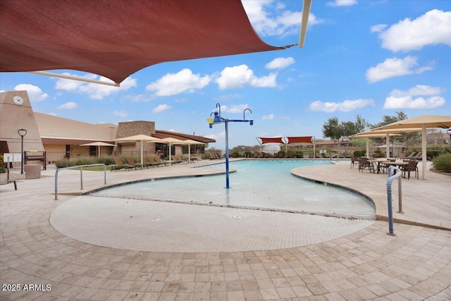 community pool featuring a patio