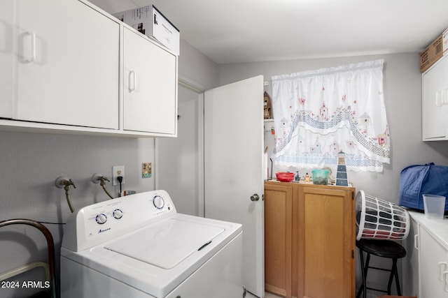 laundry area featuring cabinets and washer hookup