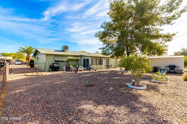 back of house featuring a patio and central AC unit