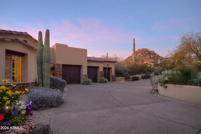 view of front of property featuring a garage