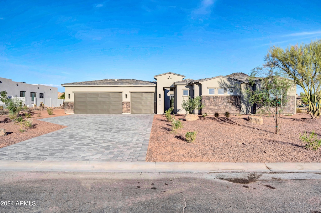 view of front of property featuring a garage