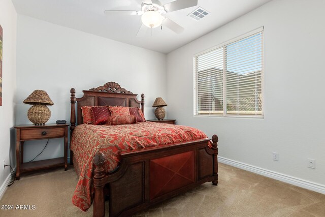 carpeted bedroom featuring ceiling fan