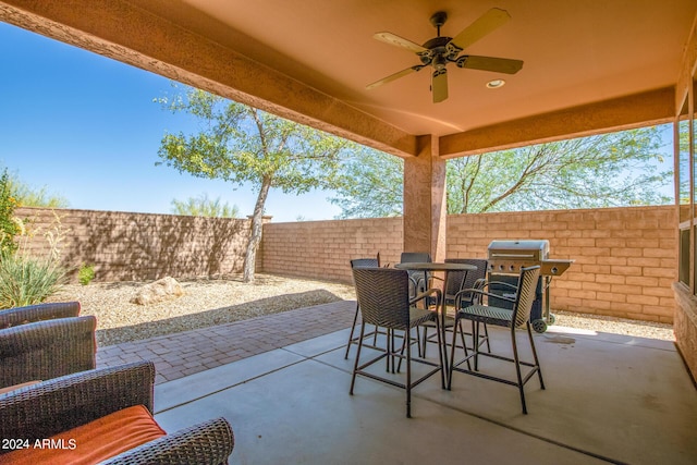 26723 N 127th Dr, Peoria, AZ 85383 - view of patio / terrace with area for grilling, outdoor dining area, a fenced backyard, and ceiling fan