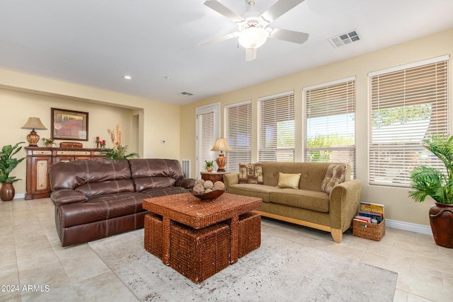 26723 N 127th Dr, Peoria, AZ 85383 - living room featuring light tile patterned floors, visible vents, baseboards, and ceiling fan