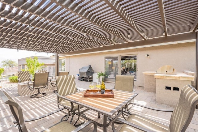 15746 E Sycamore Dr, Fountain Hills, AZ 85268 - view of patio / terrace with grilling area, fence, outdoor dining area, and a pergola