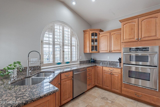 15746 E Sycamore Dr, Fountain Hills, AZ 85268 - kitchen with stainless steel appliances, vaulted ceiling, a sink, and dark stone counters