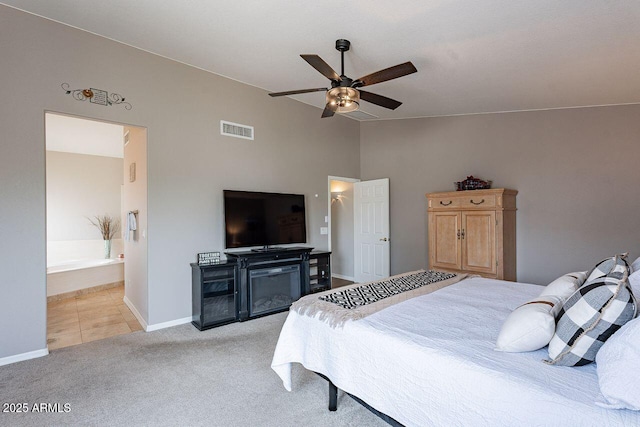15746 E Sycamore Dr, Fountain Hills, AZ 85268 - bedroom with lofted ceiling, baseboards, light carpet, visible vents, and ceiling fan